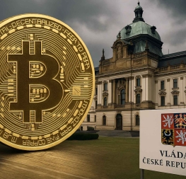 Ilustrační obrázek: symbol bitcoinu před budovou Úřadu vlády České republiky – vizuální ztvárnění kauzy spojené s vládou Petra Fialy.